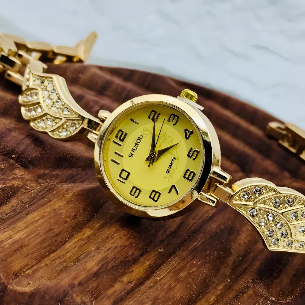 Women's stainless steel watch with round dial showing gold surface option and vachette clasp buckle
