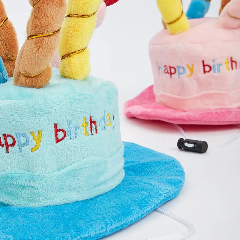 Blue and pink small dog birthday hats for toy breeds on a white background.