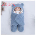 Quilted baby sleeping bag wrapper in light blue, shown laid flat with size and colour options visible.