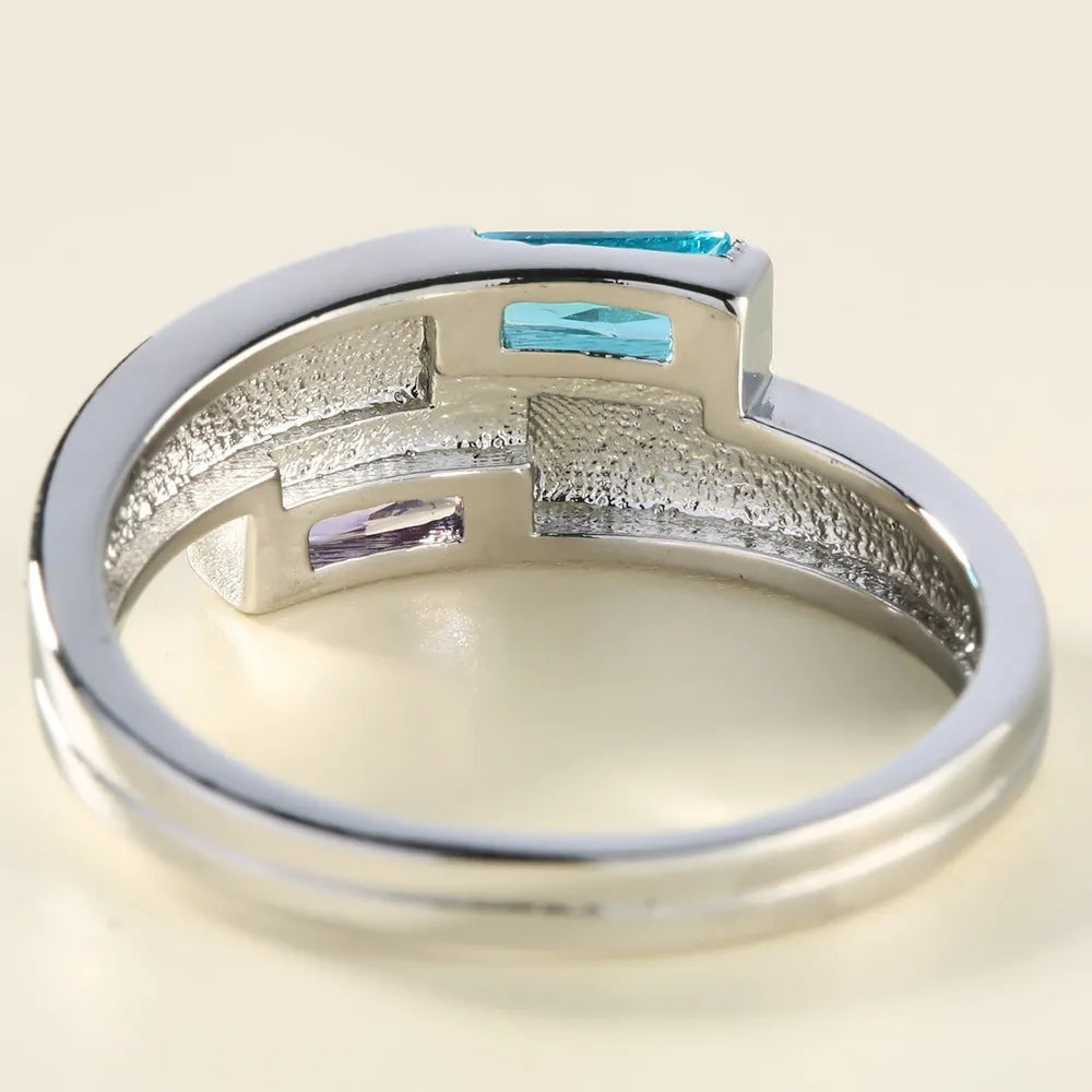 Copper electroplated zircon ring with silver colour finish showing contemporary European American jewellery design