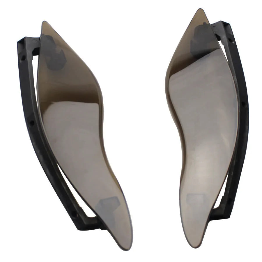Pair of smoked ABS windshield side wings for a Harley-Davidson trike conversion.