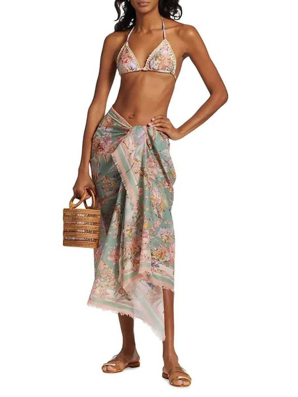 Women's creamy-white floral bikini set with matching skirt for beach and swimming