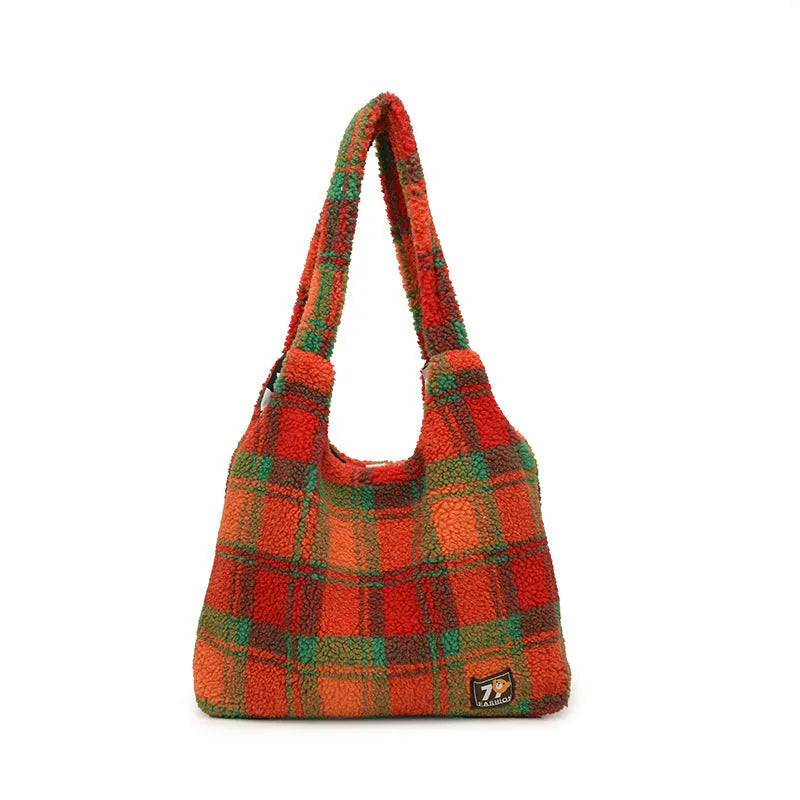 Women's plaid crossbody shoulder bag in soft plush fabric showing horizontal square shape and large capacity