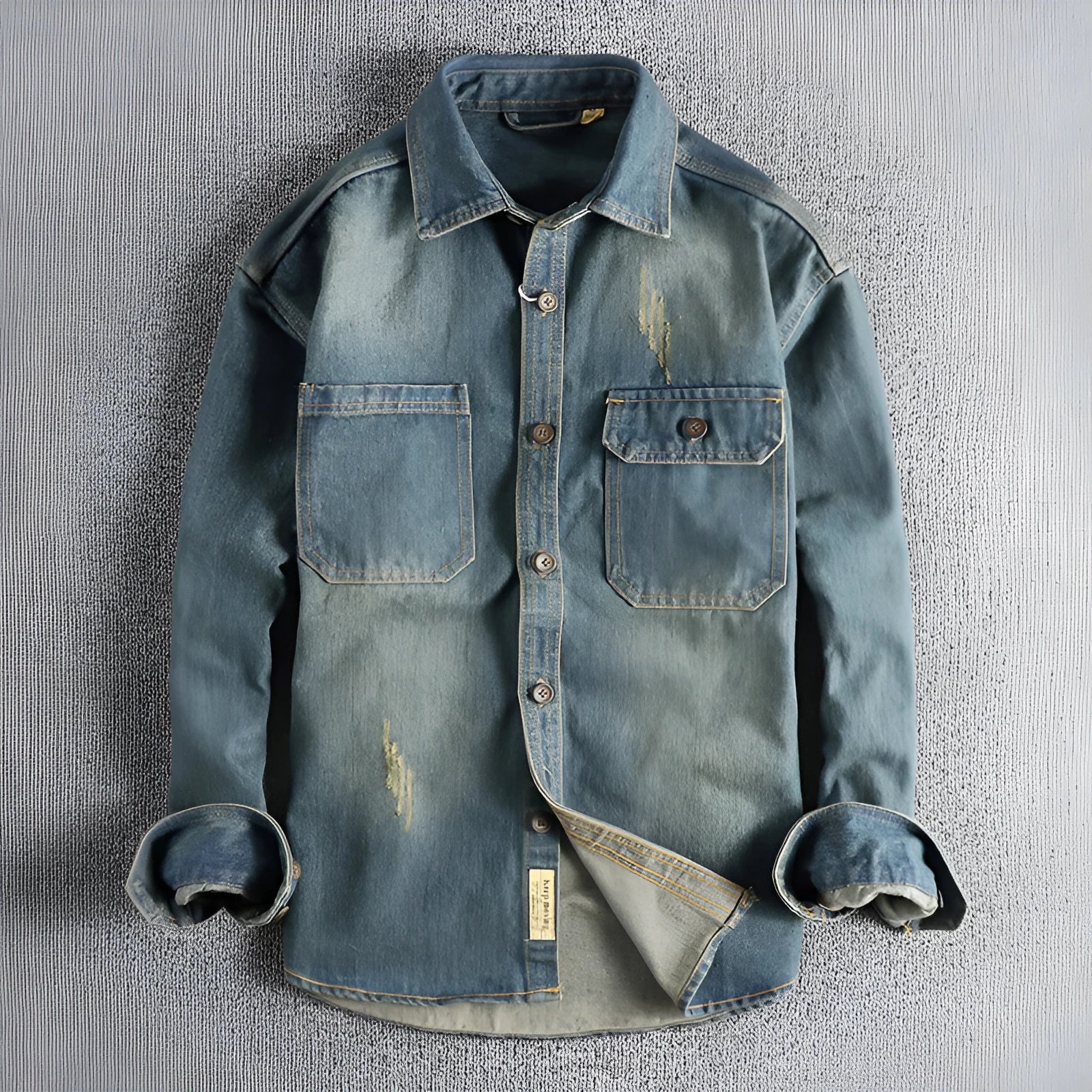 Men's light blue vintage denim shirt with loose cardigan styling and long sleeves