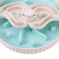 Grey rotating pet slow feeder bowl with a blue silicone windmill-pattern licking mat attached.