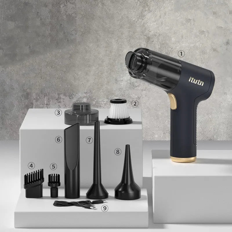 Black wireless handheld car vacuum cleaner with tyre inflation function and multiple attachments