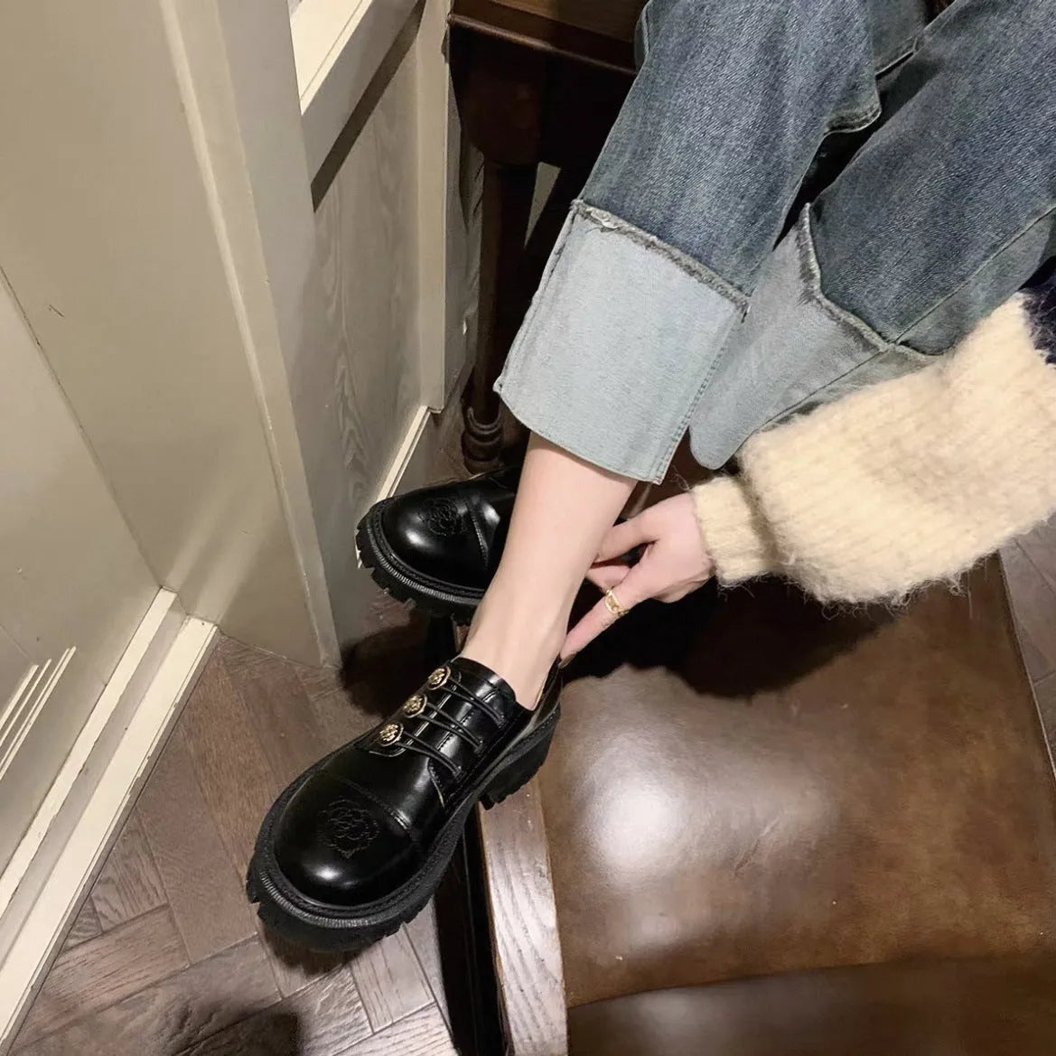 Glossy black block heel pumps with round toe and cowhide upper