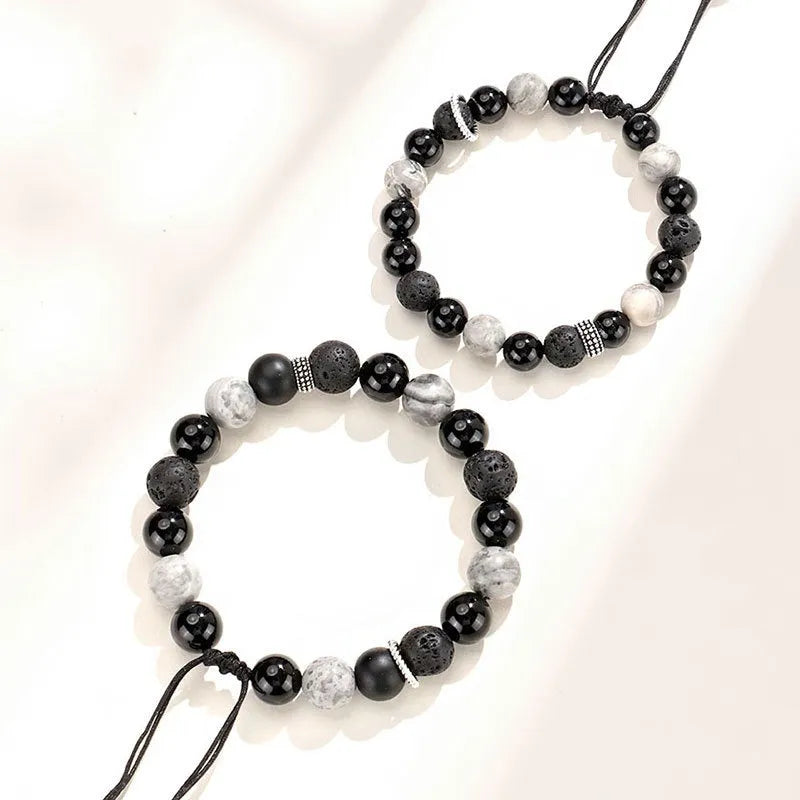 A black agate map stone volcanic rock bracelet with diamond-shaped beads in a New Chinese style unisex design.