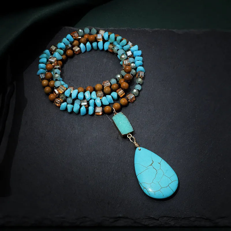 Blue turquoise water drop pendant necklace with heart-shaped gem inlay on ball bead chain