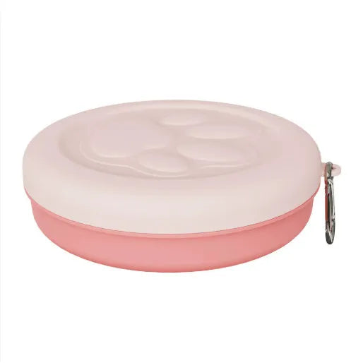 Portable collapsible dog bowl with attached snack box in light pink and light green colour options