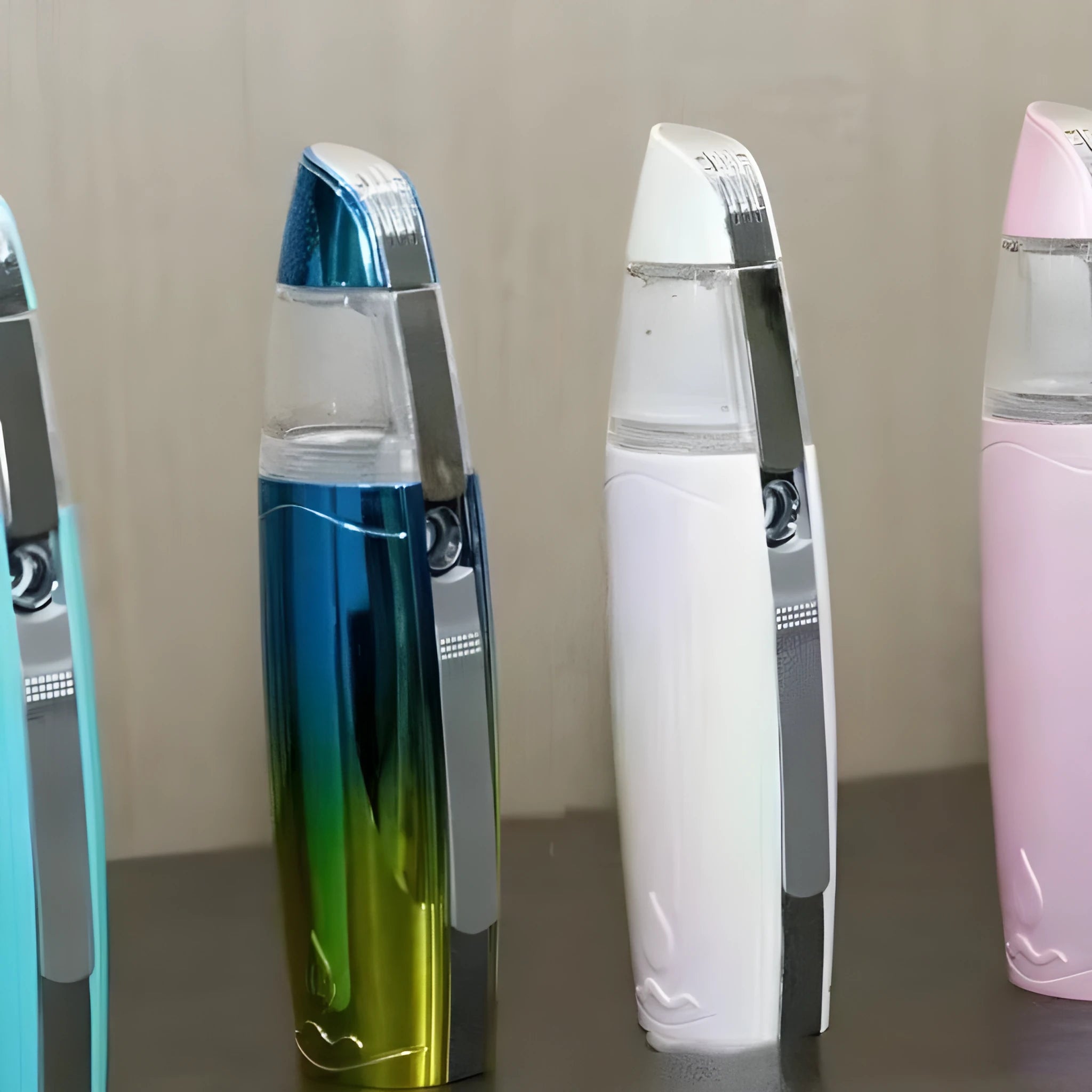 Peacock blue handheld USB rechargeable facial steamer with hydrogen-rich water spray