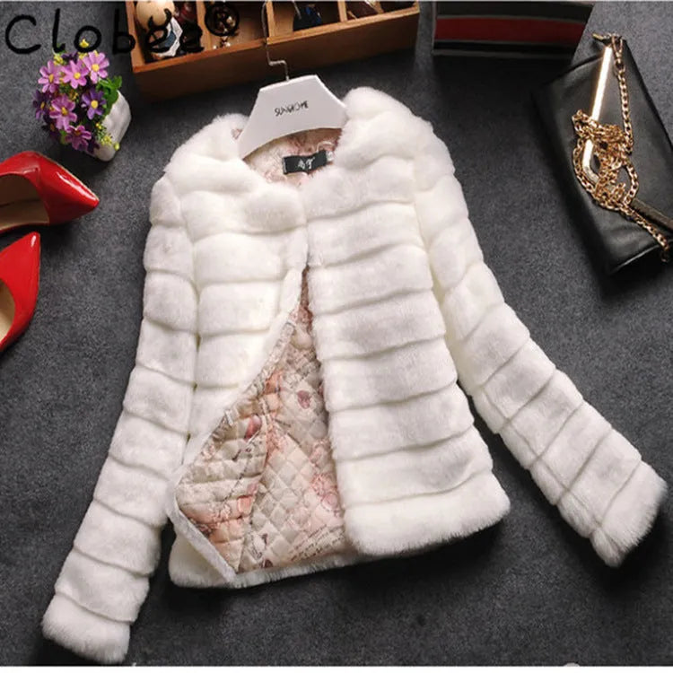 Women's short-length faux fur jumper in beige, shown with regular sleeves and a textured rabbit fur-style pile.