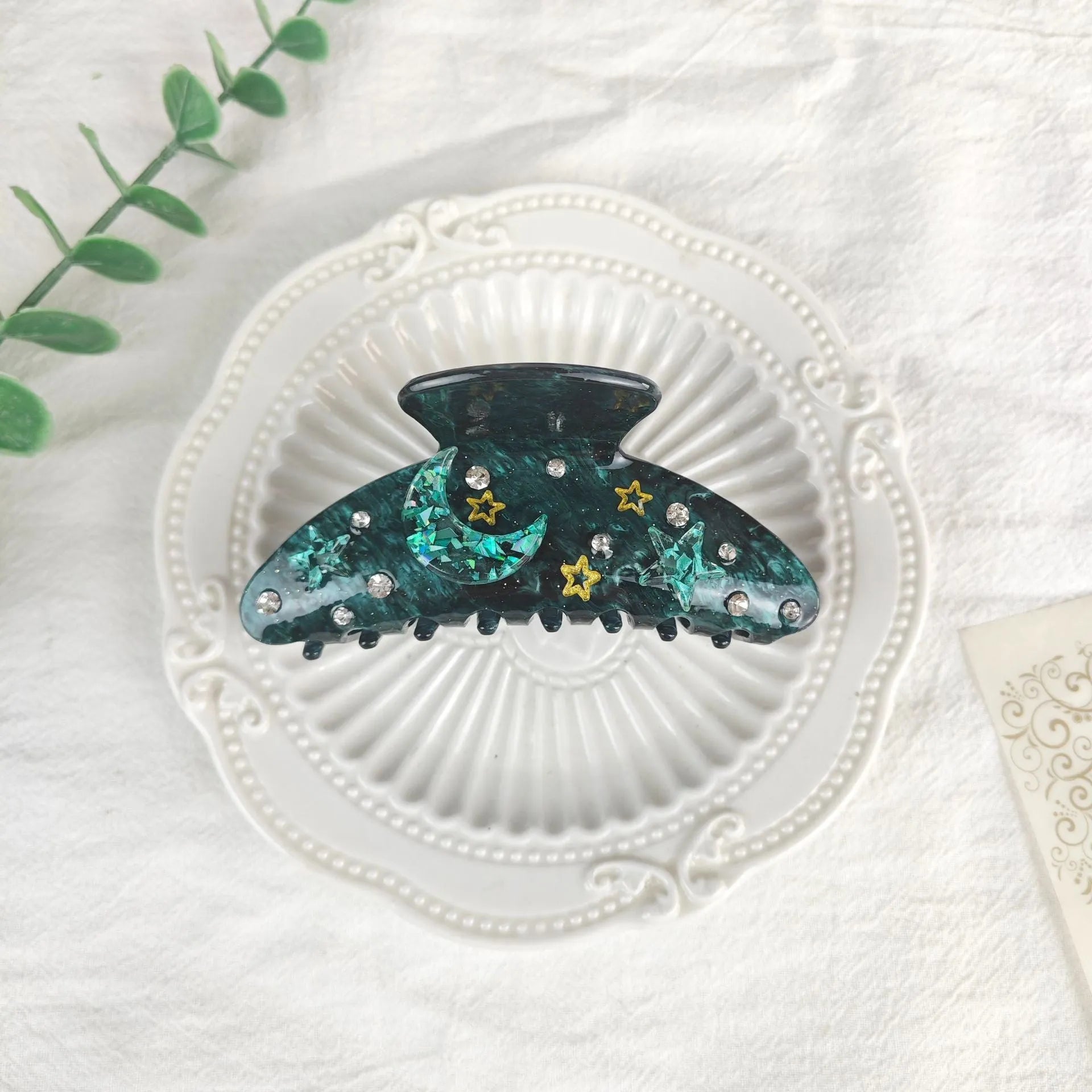 Oversized women's barrette hair clip with a starry sky pattern in sky blue.