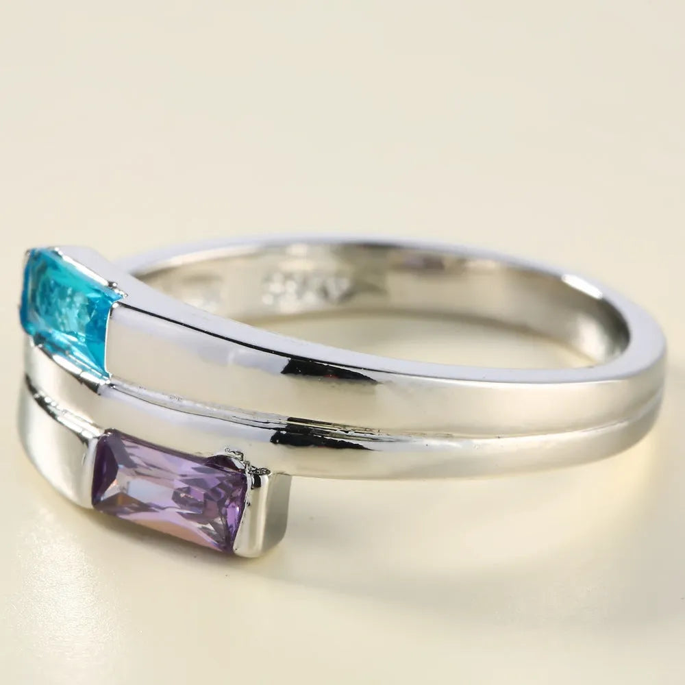 Copper electroplated zircon ring with silver colour finish showing contemporary European American jewellery design