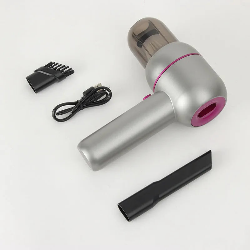 Grey handheld portable car vacuum cleaner with brush nozzle and extended nozzle for dust removal and inflation.
