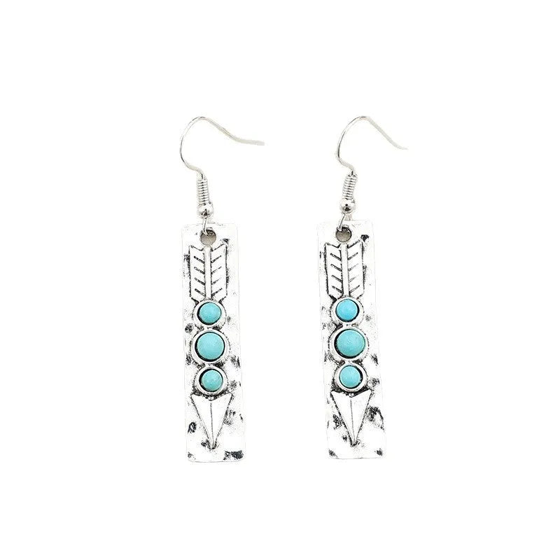 Silver geometric earrings with turquoise inlay on long strip zinc alloy design