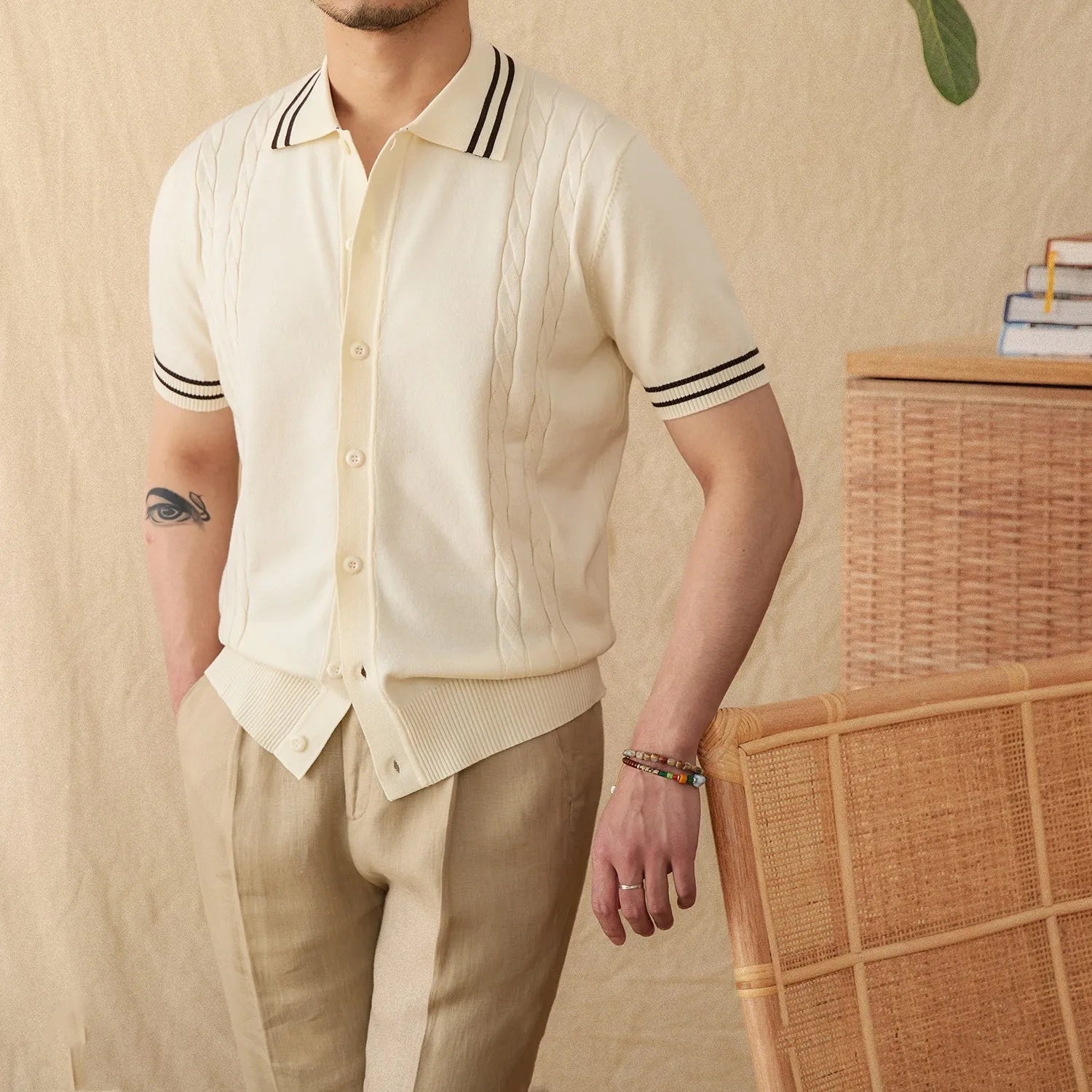 Men's apricot lapel polo shirt with short sleeves made from cotton polyester blend fabric.