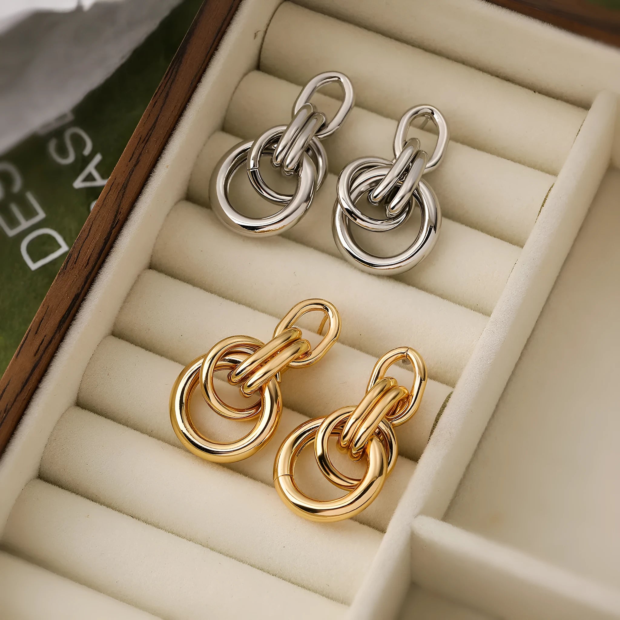 Geometric copper earrings with gold colour finish in irregular shape