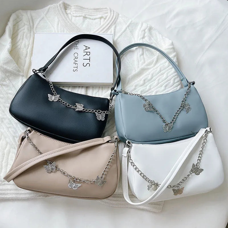 Butterfly chain underarm crossbody bag in horizontal square shape with three-dimensional pocket