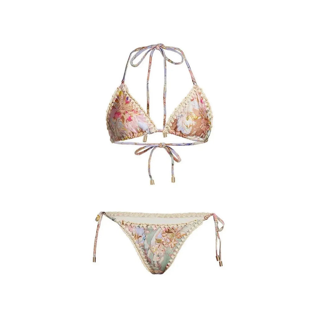 Women's creamy-white floral bikini set with matching skirt for beach and swimming