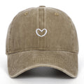 Retro embroidered cotton peaked cap in an adjustable size on a neutral background.