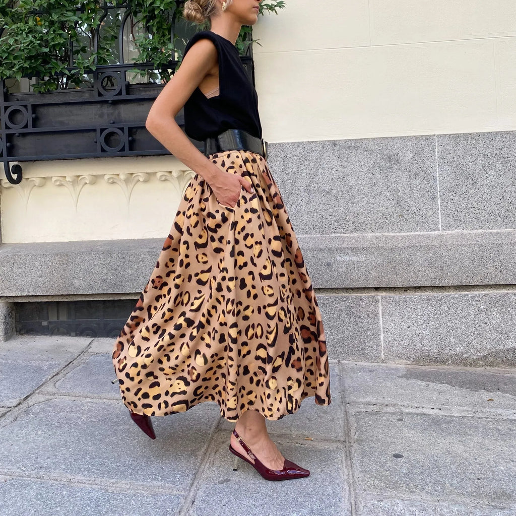 Brown leopard print women's A-line skirt with long length and big hem in polyester fabric