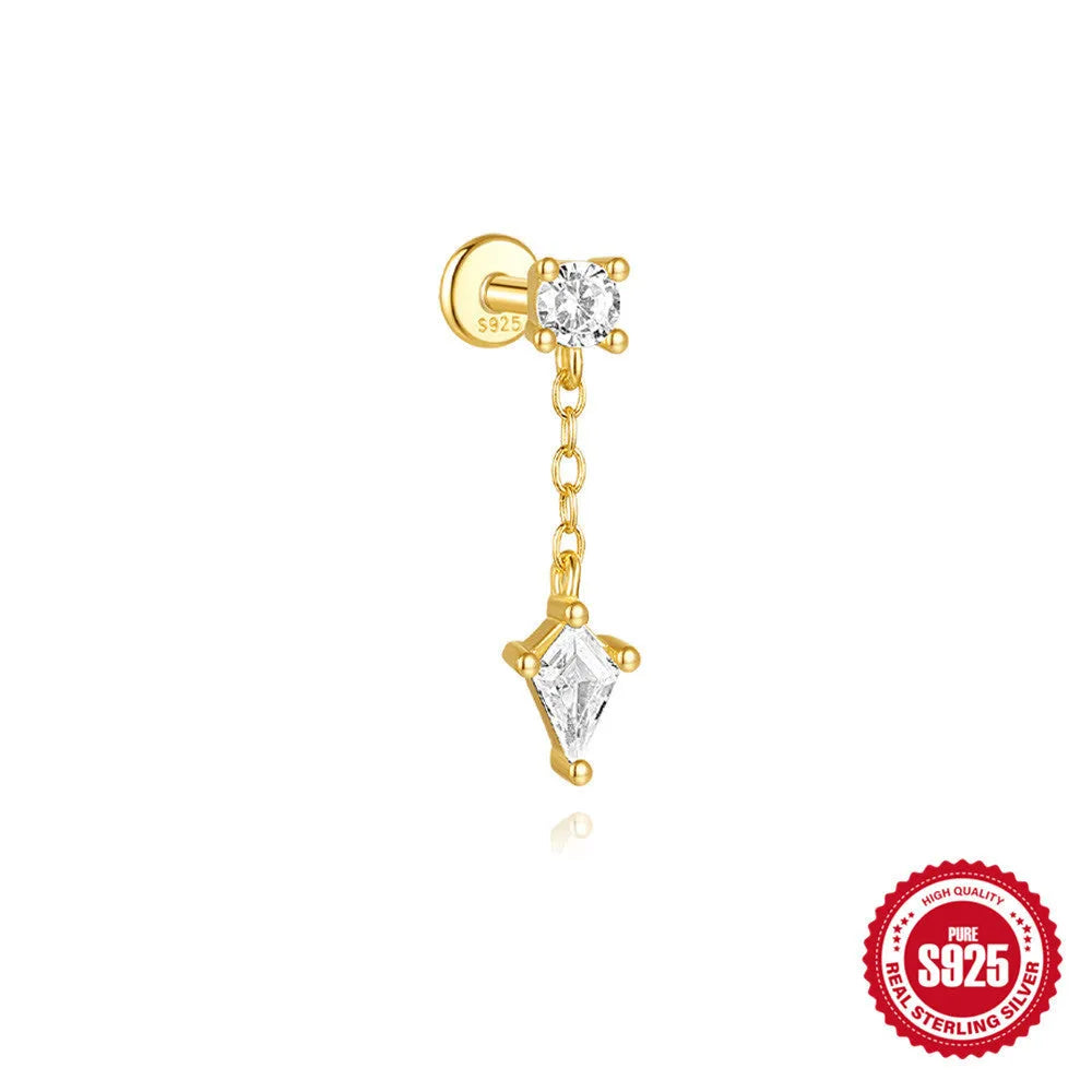 Geometric kite-shaped sterling silver earring with rhinestone head and gold chain tassel.