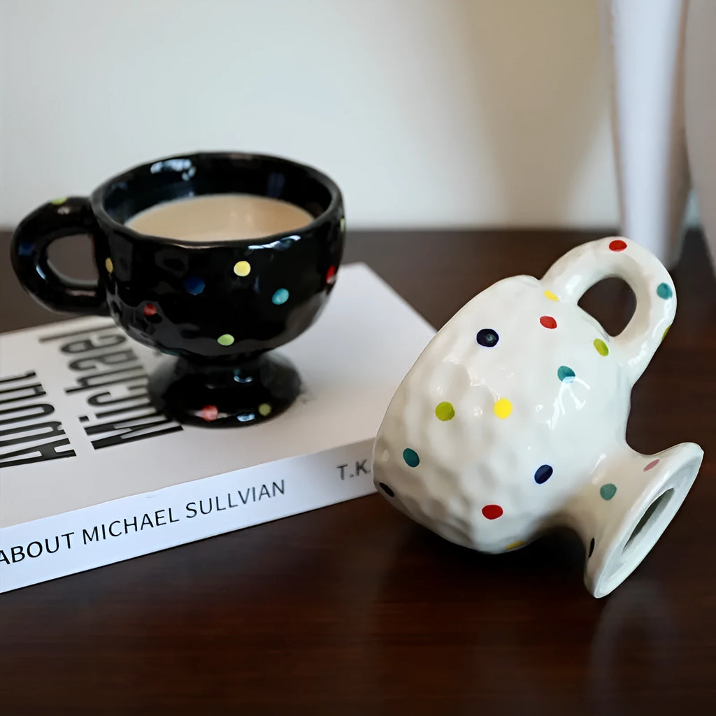 Hand-pinched irregular ceramic mug with solid colour design, approximately 14.5cm tall