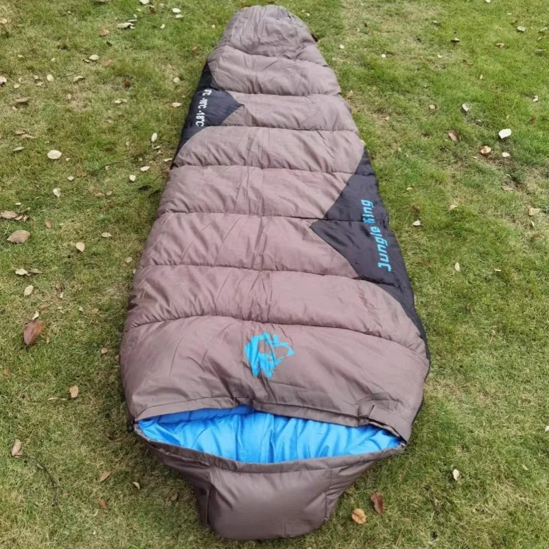 Mummy-style outdoor sleeping bag in army green with compression storage bag for camping