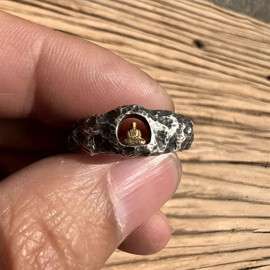 Copper Buddha ring with textured grotto surface showing hand-forged details and retro styling