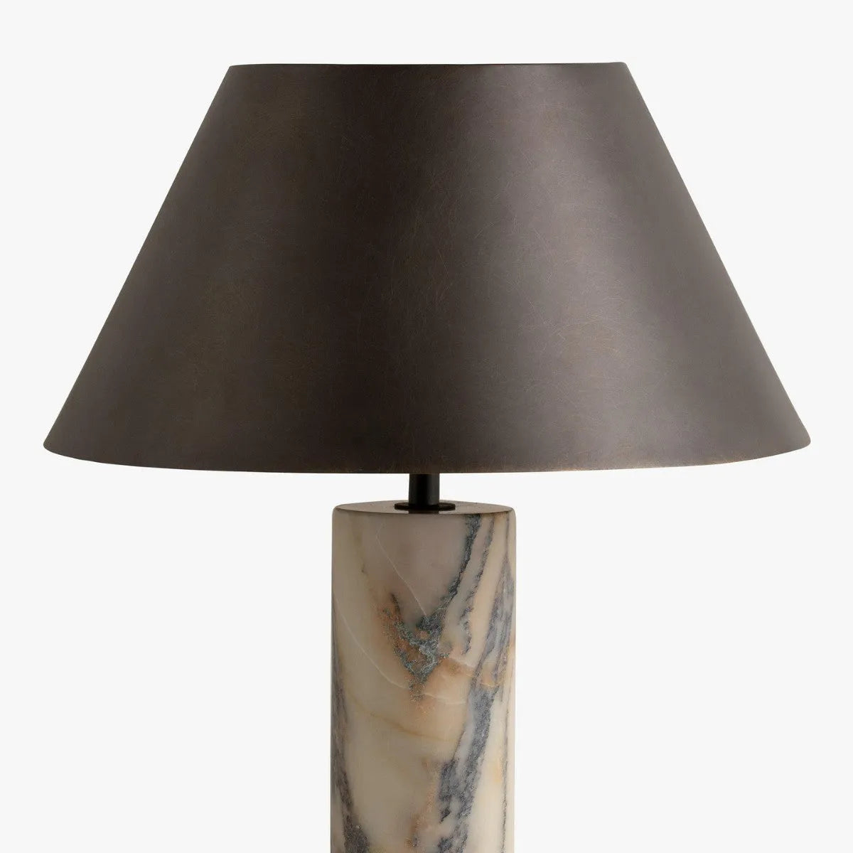 Black marble table lamp with modern simple design on wooden surface