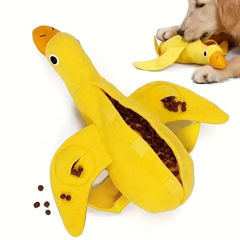 Yellow teddy dog toy with integrated duck doll, a pet training aid with sound and treat dispenser.