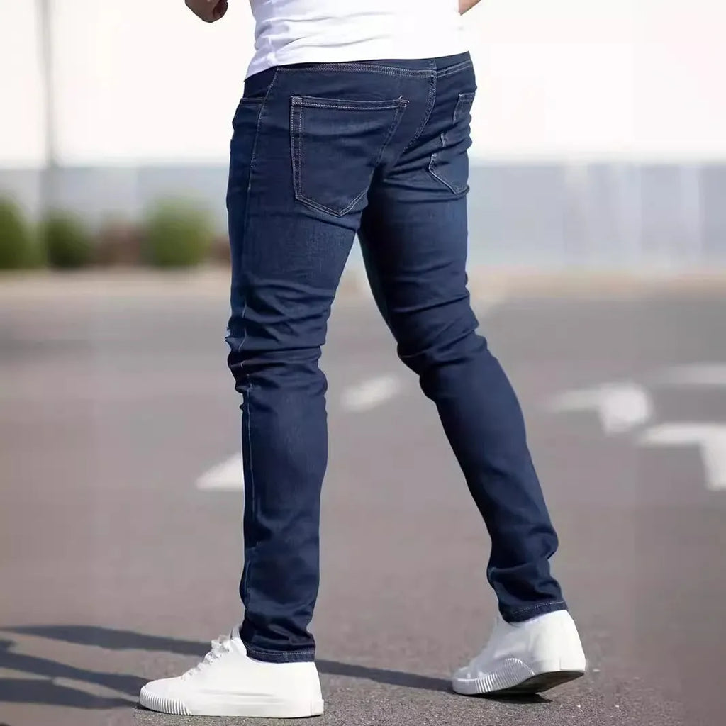 Men's dark blue slim fit jeans with elastic cotton fabric and zipper fly