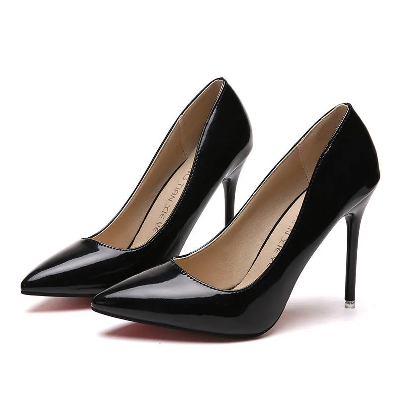 Women's pointed-toe stiletto heel pumps in apricot colour with a super high heel.