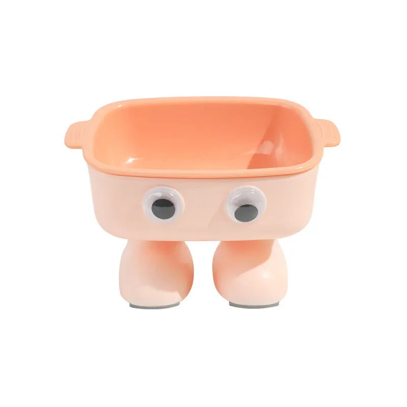 Green robot-shaped elevated cat bowl with tilted dish and anti-slip base.