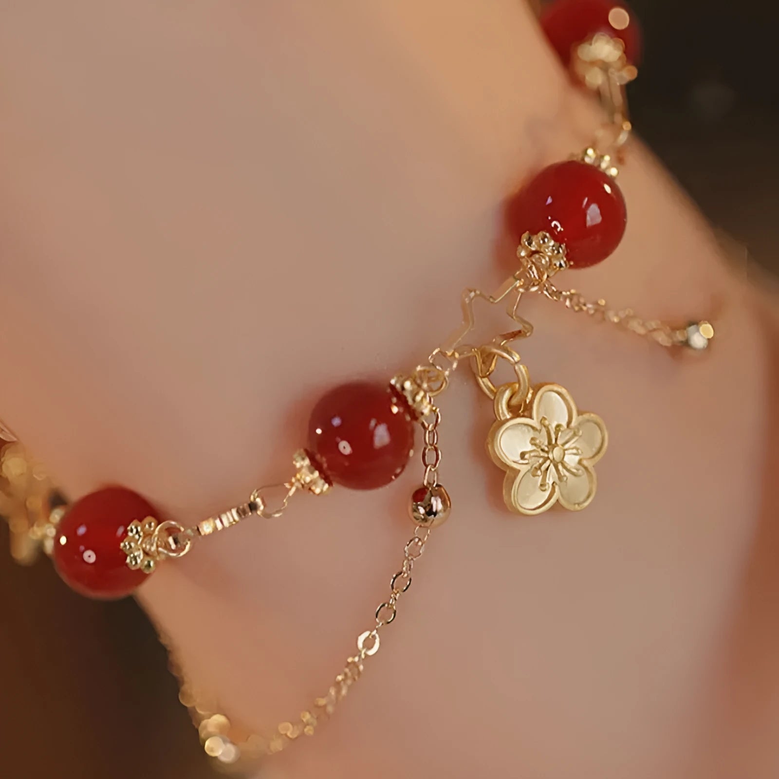 Handmade double layer red agate bracelet with peach blossom and flower design for women.