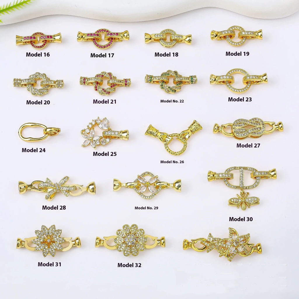 Small gold colour necklace clasp buckle for DIY jewellery on a white background.