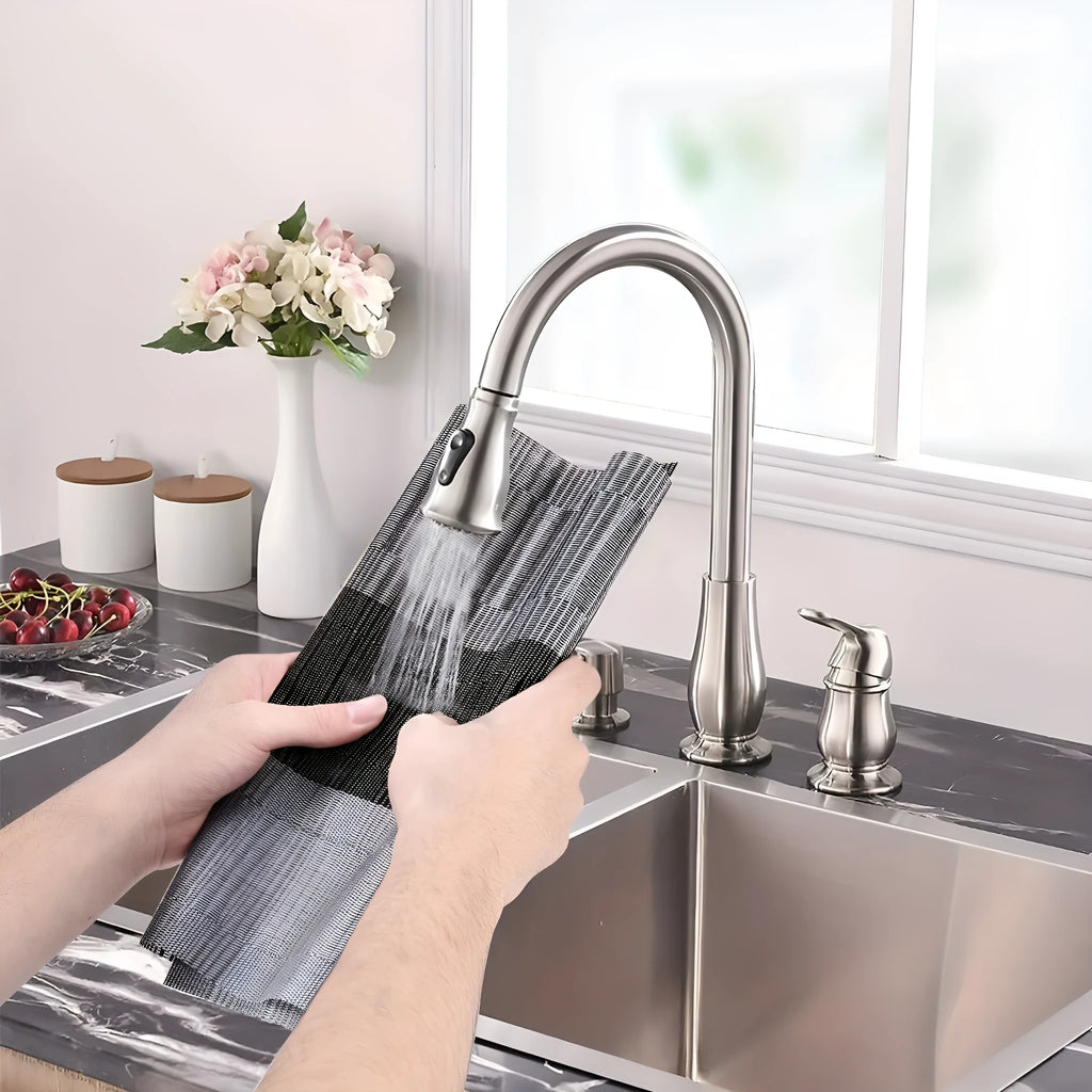 Modern PVC kitchen sink mat in a gradient bamboo colour on a countertop, showing its non-slip texture and size.
