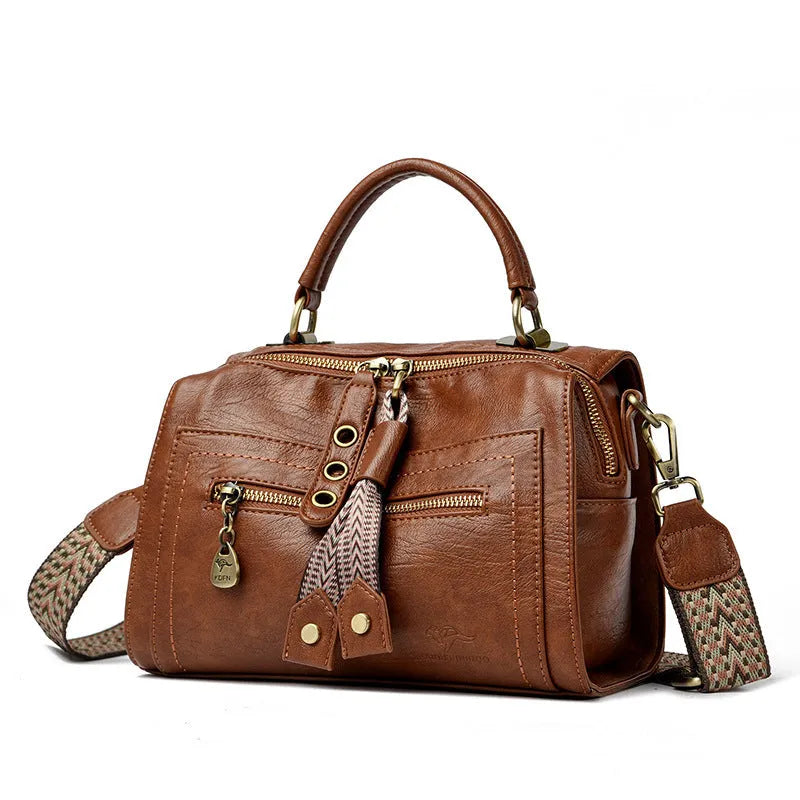 Soft grey PU women's crossbody bag with a square shape and an external sandwich pocket.