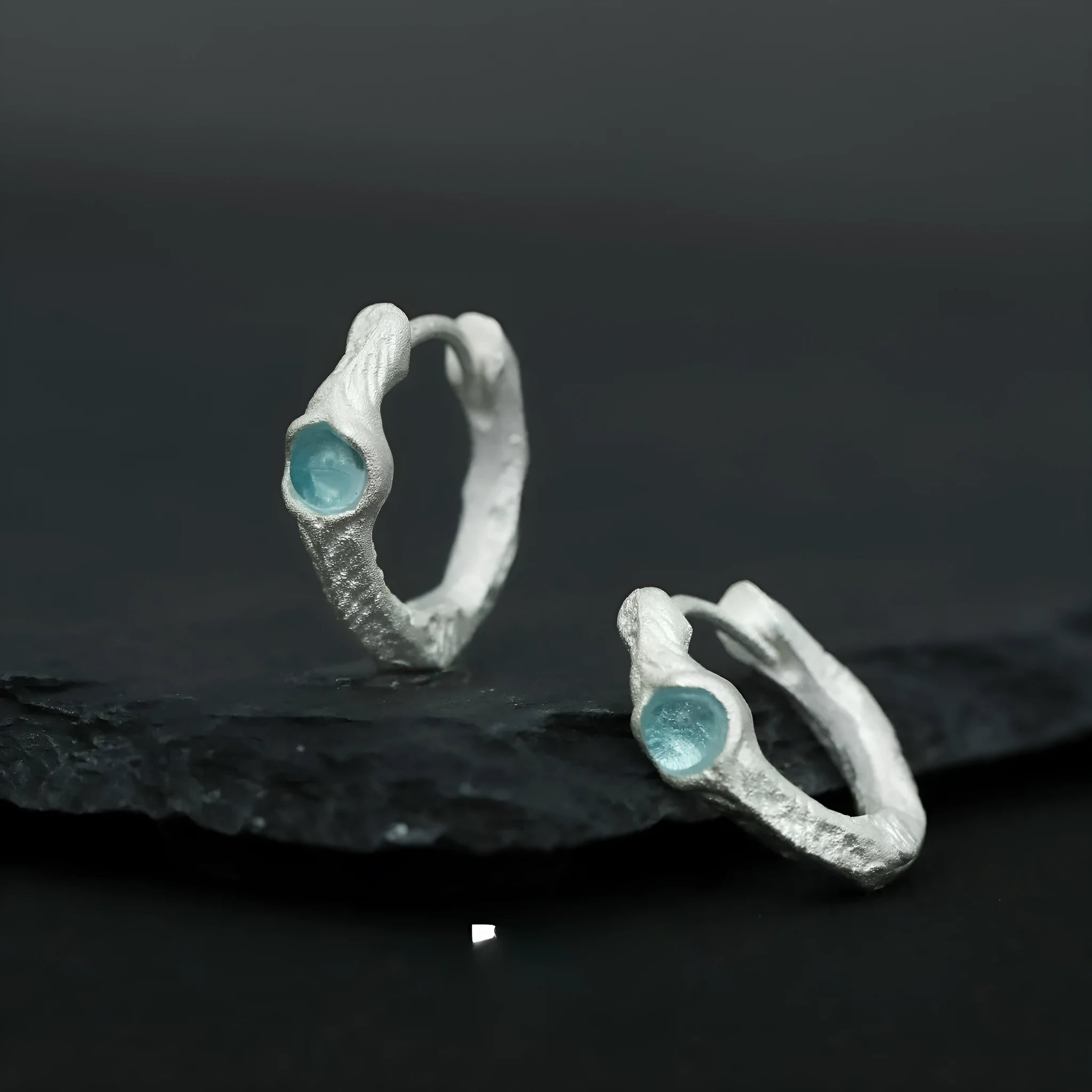 925 sterling silver geometric ear clip with burnt silver electroplated finish and round elements