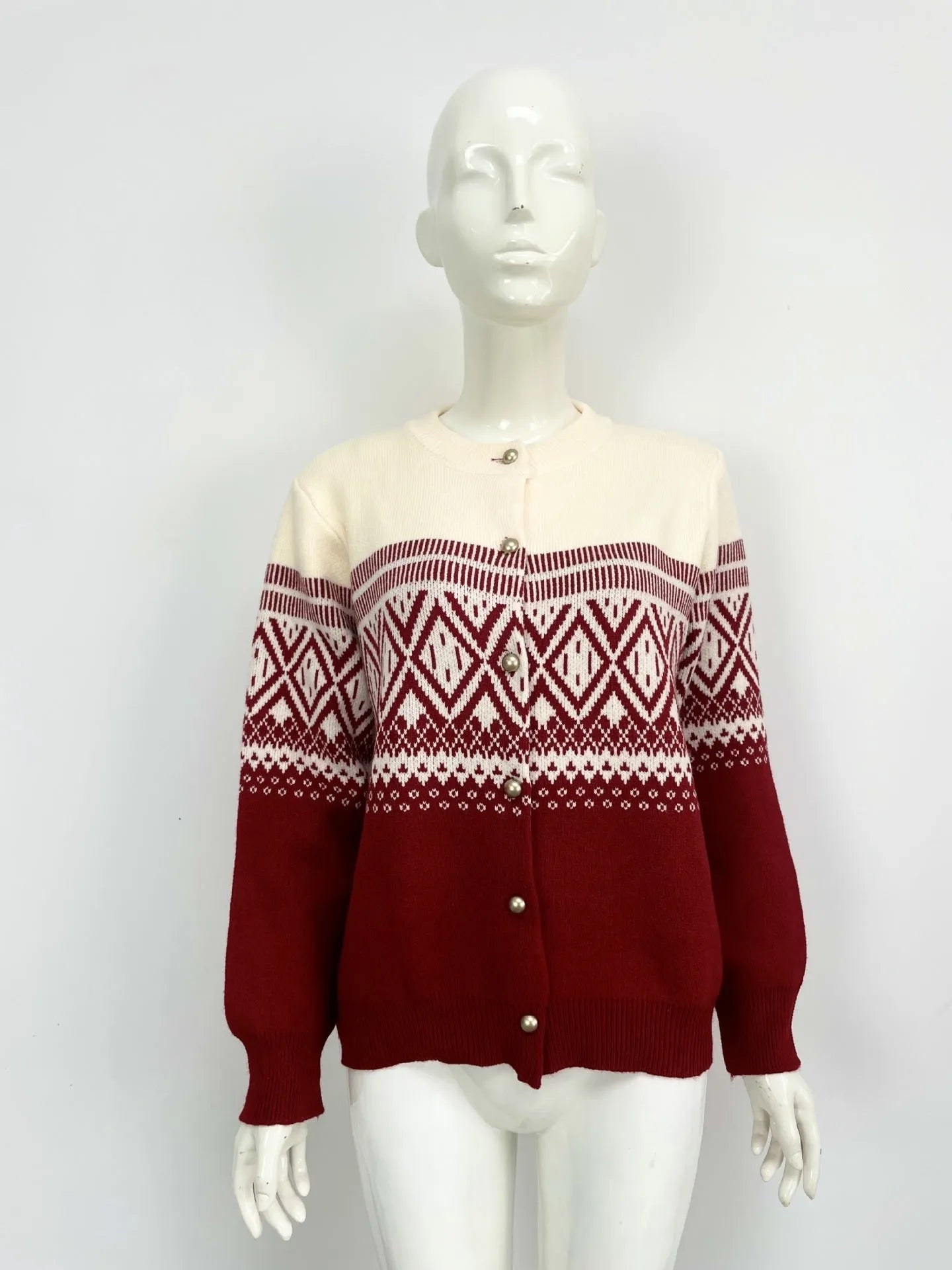 Women's red alpaca wool cardigan with grey diamond knit pattern and long sleeves