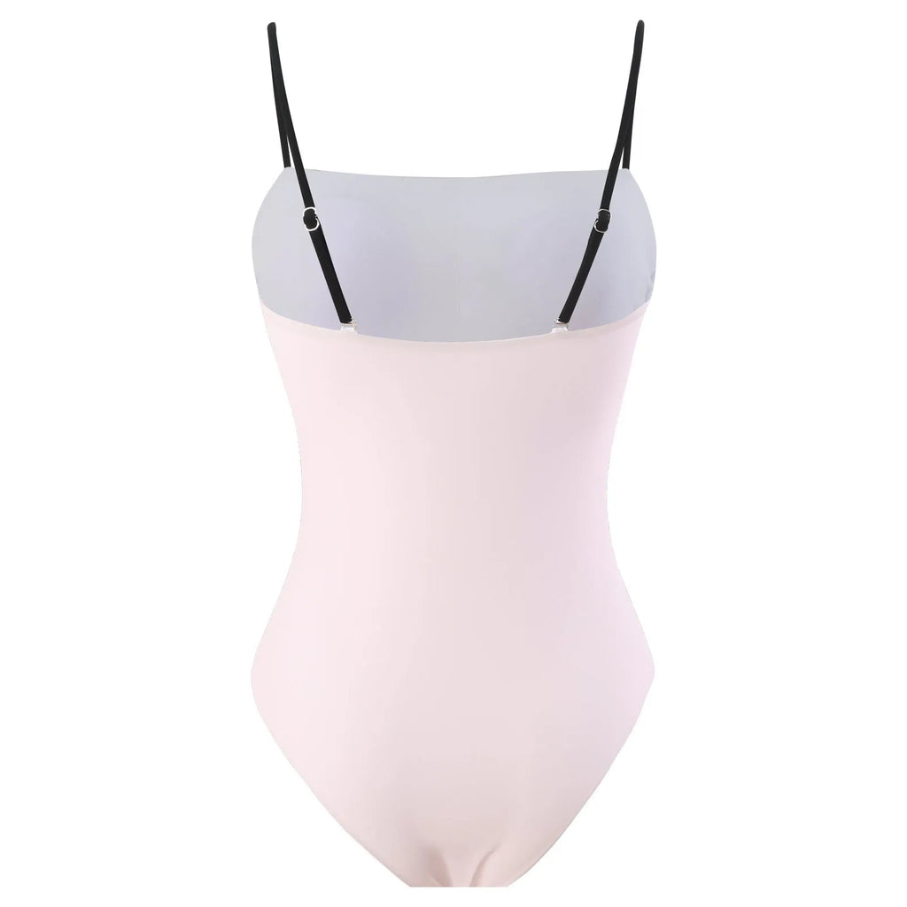 Women's patterned bikini swimsuit with a lightweight white tulle skirt attached.