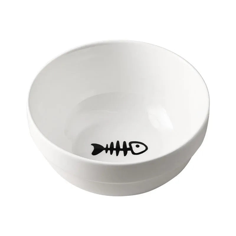 Ceramic cat bowl with iron frame stand showing cat paw print pattern and gold metal finish