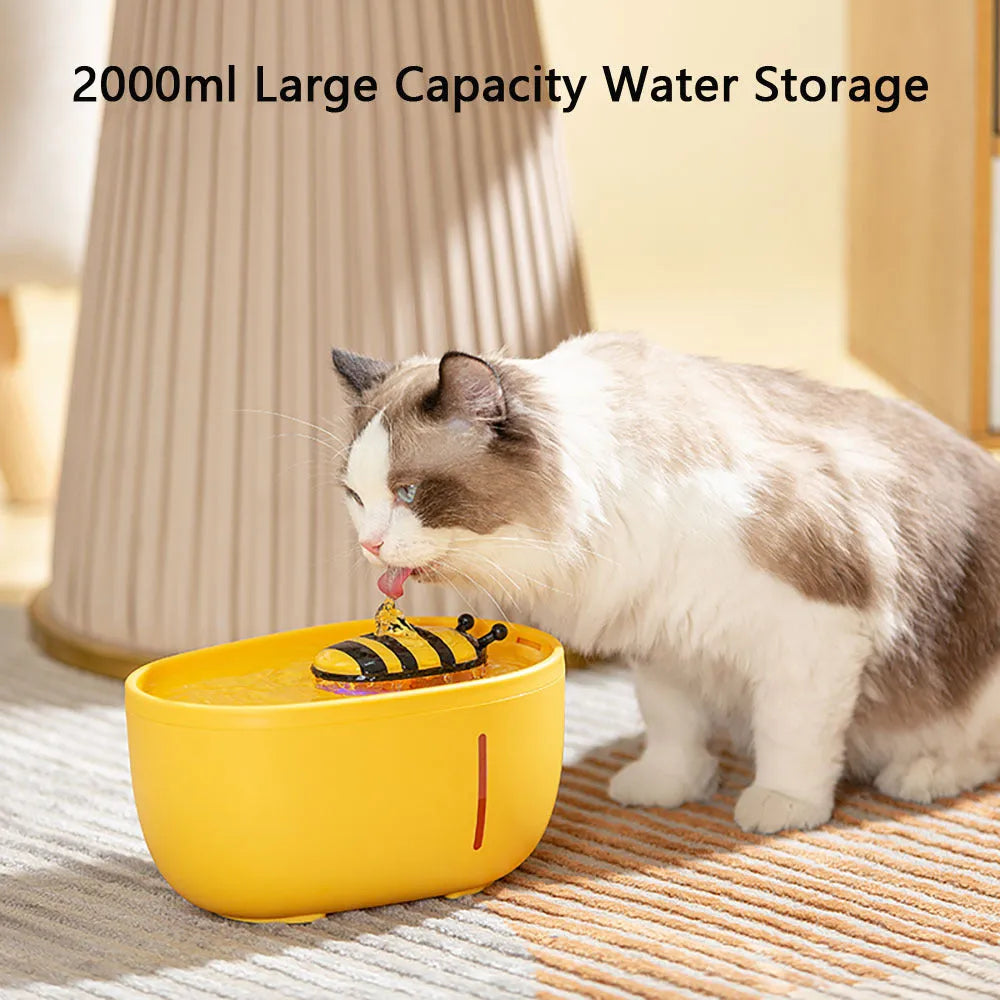 Yellow cat water fountain with filtration system, water level window, and USB pump