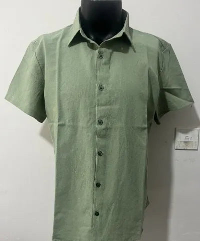 Men's loose fit short sleeve linen shirt in apricot colour on a hanger