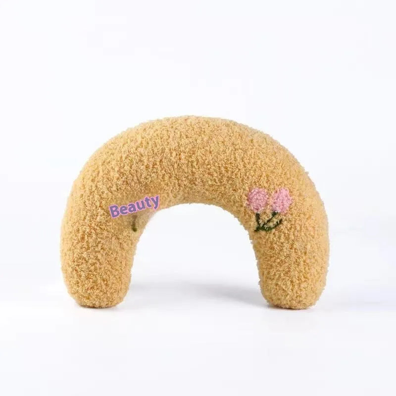 Blue, white and yellow U-shaped cat pillow in Moon and question mark styles for pet beds.