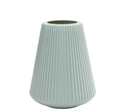 Melamine plastic decorative vase 16cm diameter in blue colour on wooden desktop
