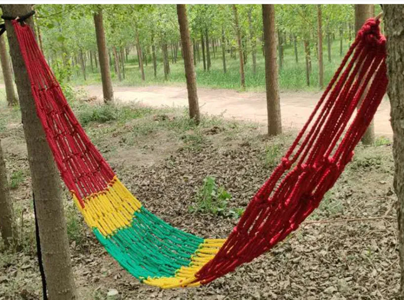 Nylon rope mesh hammock hung between trees showing 1.1m width
