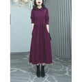 Purplish red plus size women's dress with extra long sleeves and urban style design