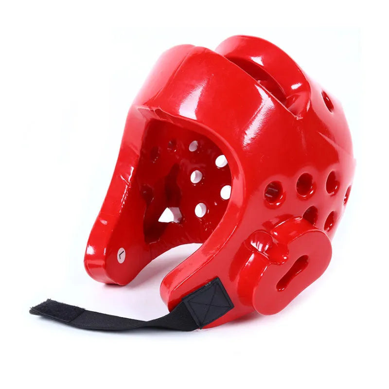 Karate protective gear set with red boxing gloves, leg guards and helmet for martial arts training